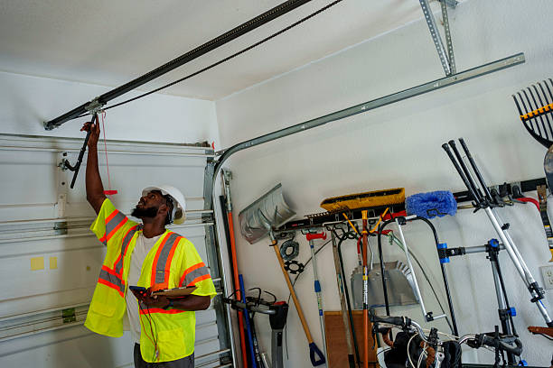 Professional Garage Door Spring Repair technician working in Village Green, NY